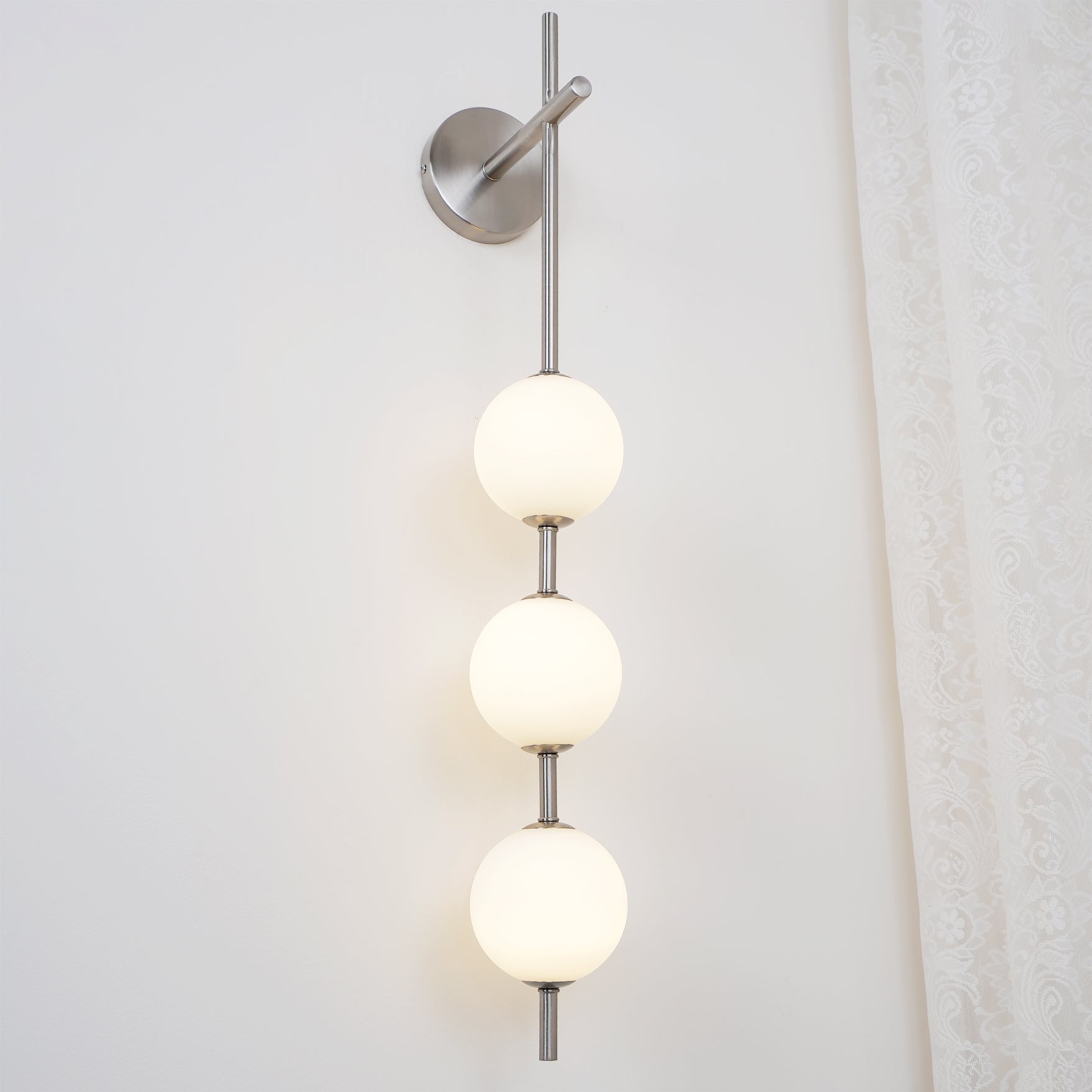 Ilraeia Vertical Globe Plug-in Wall Lamp - Neutralighting