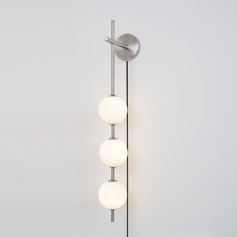 Ilraeia Vertical Globe Plug-in Wall Lamp - Neutralighting