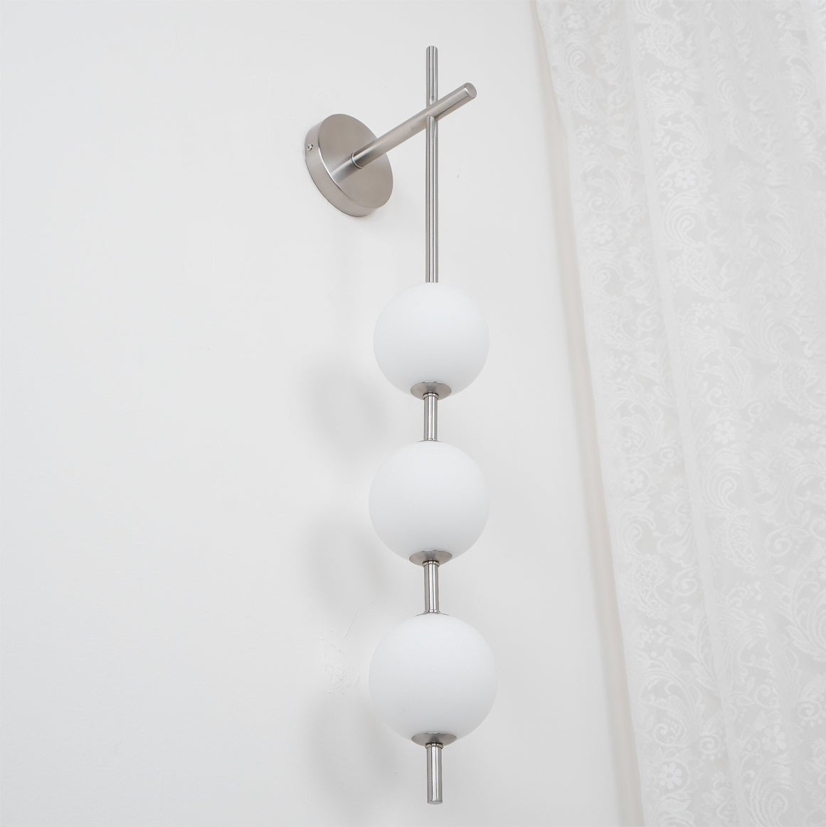 Ilraeia Vertical Globe Plug-in Wall Lamp - Neutralighting