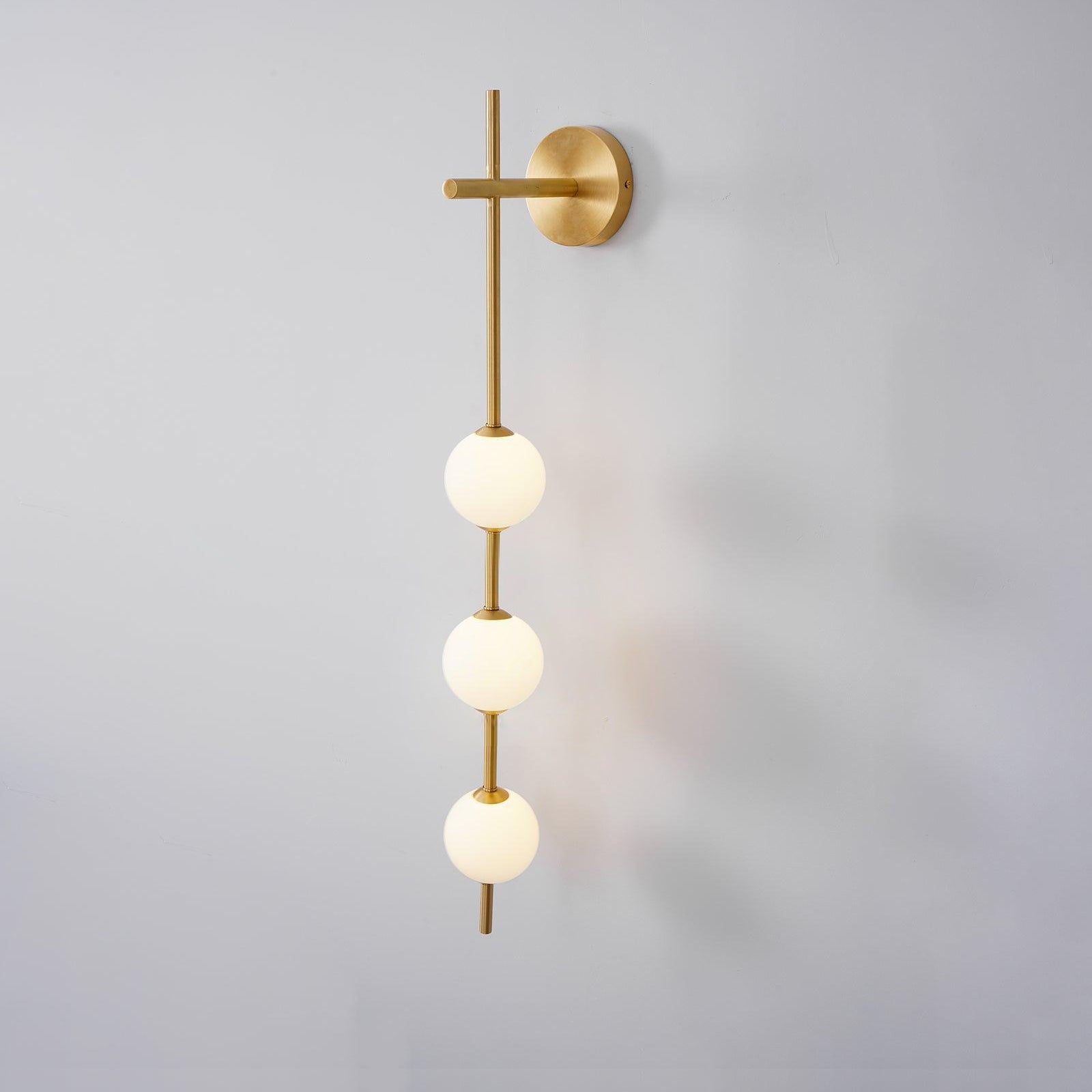 Ilraeia Vertical Globe Plug-in Wall Lamp - Neutralighting